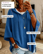 Amelie sweater details: drawstring hood, wide ribbed sleeves, ribbed hem.
