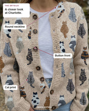 Charlotte details: Round neckline, Button front, Cat print.
