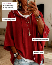 Claire sweater details: drawstring hood, wide ribbed sleeves, ribbed hem.