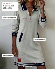 Dorellia details: Half-zip neckline, Side pockets, Striped hem.