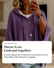 Elodie sweater editorial card: drawstring hood, wide ribbed sleeves, ribbed hem.