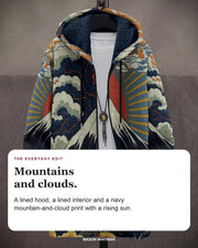 Ezra cardigan editorial card: A lined hood, a lined interior and a navy mountain-and-cloud print with a rising sun.