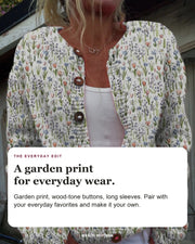 Ivadelle editorial styling card: Garden print, Wood-tone buttons, Long sleeves.