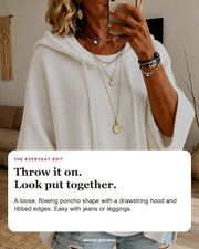 Janice sweater editorial card: drawstring hood, wide ribbed sleeves, ribbed hem.