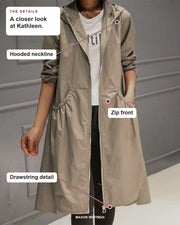 Kathleen details: Hooded neckline, Zip front, Drawstring detail.