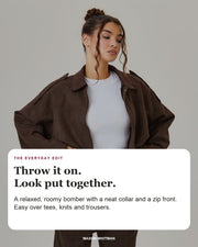 Louisa jacket editorial card: neat point collar, relaxed oversized cut, zip front.