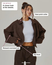 Louisa jacket details: neat point collar, relaxed oversized cut, zip front.