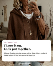 Louise sweater editorial card: drawstring hood, wide ribbed sleeves, ribbed hem.