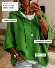 Margaux sweater details: drawstring hood, wide ribbed sleeves, ribbed hem.