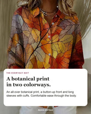 Melrose blouse editorial card: botanical print, button-up front, cuffed sleeves.