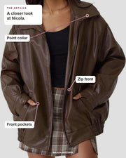 Nicola details: Point collar, Zip front, Front pockets.
