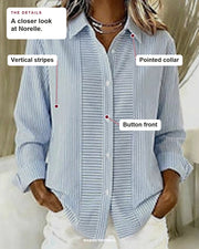 Norelle blouse details: pointed collar, button front, vertical stripes.