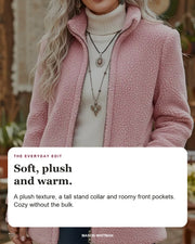 Patricia coat editorial card: tall stand collar, soft plush texture, front pockets.