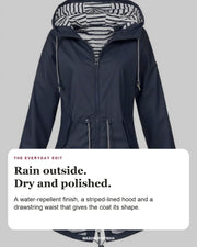 Rosalind coat editorial card: striped-lined hood, full-length zip, drawstring waist.