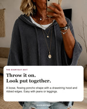 Sabine sweater editorial card: drawstring hood, wide ribbed sleeves, ribbed hem.