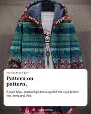 Sophie hoodie editorial card: A lined hood, drawstrings and a layered folk-style print in teal, berry and gold.